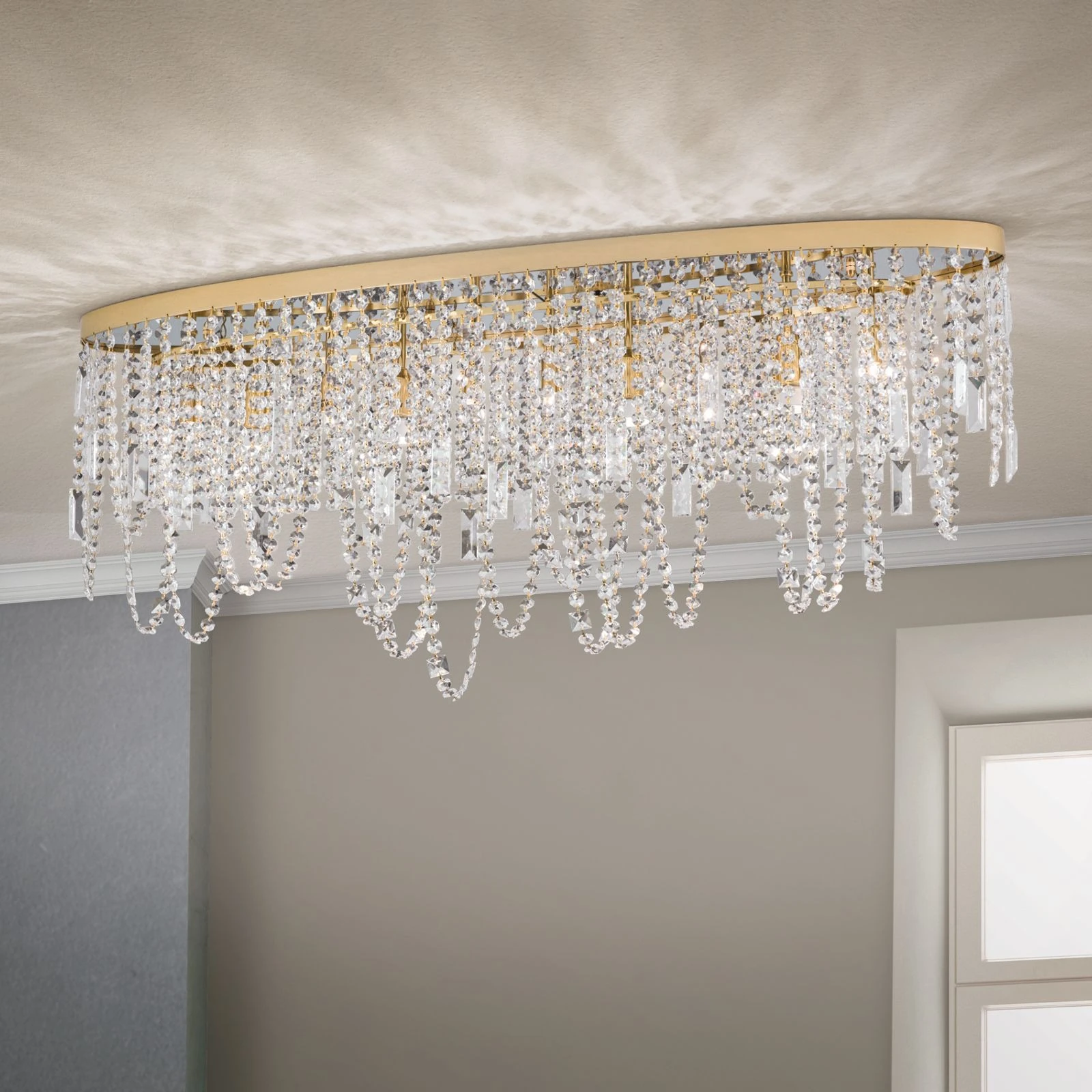 Plafonska lampa KRISTALLDESIGN, ovalni oblik, pozlaćena, 110 × 25 cm - 1