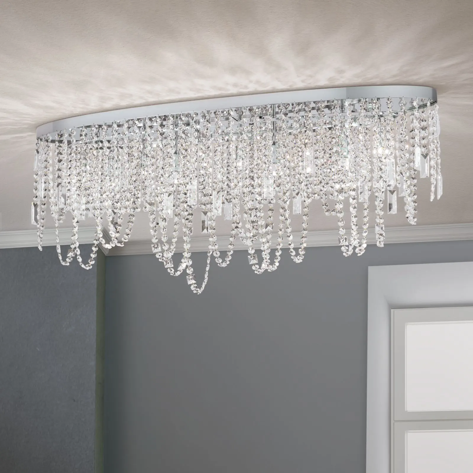 Plafonska lampa KRISTALLDESIGN, ovalni oblik, hromirana, 110 × 25 cm - 1